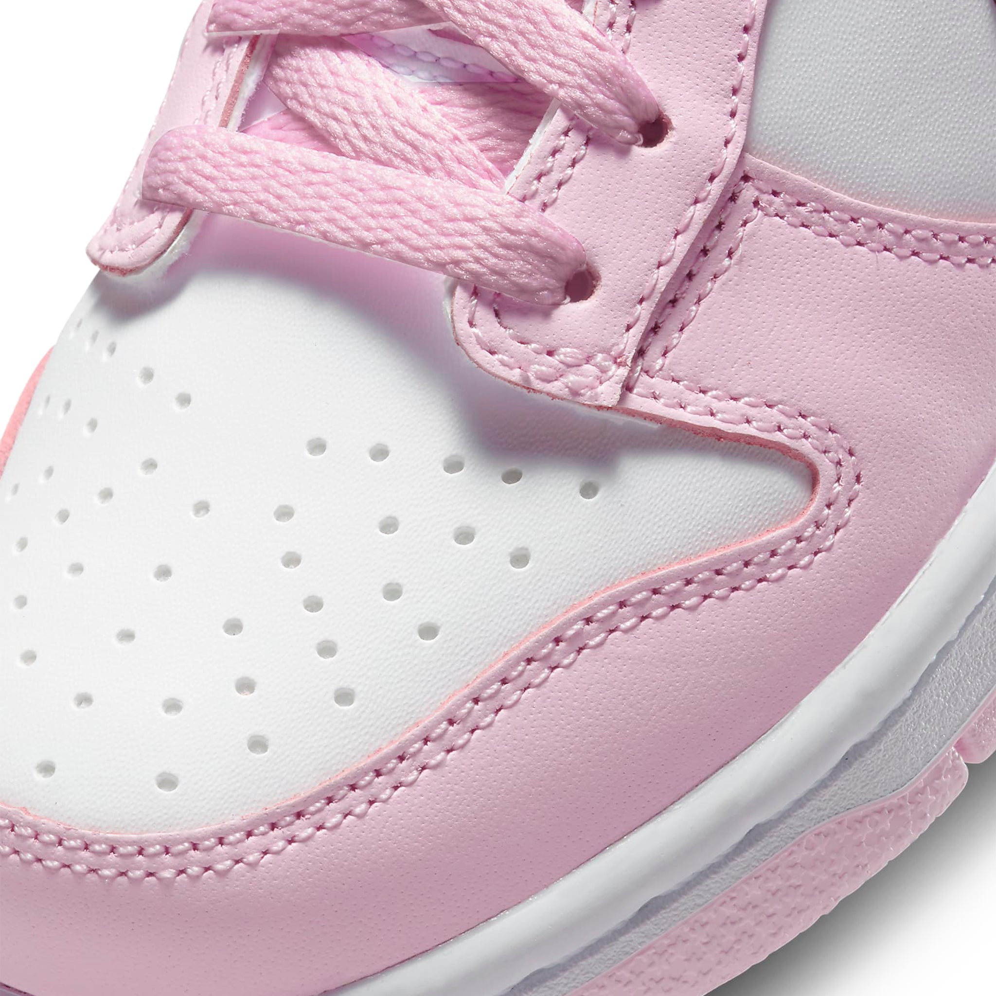 Toe box view of Nike Dunk Low Pink Red White (GS) CW1590-601